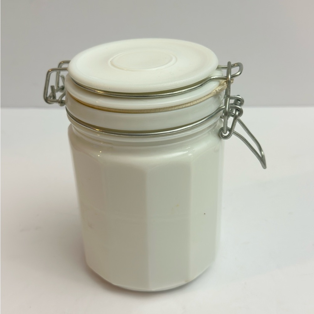 Vtg‎ white milk glass storage jar w/ a wire bail closure & a 12-sided design